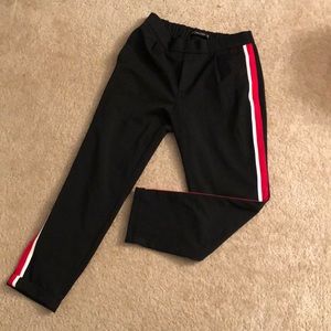Black tapered pants; not joggers